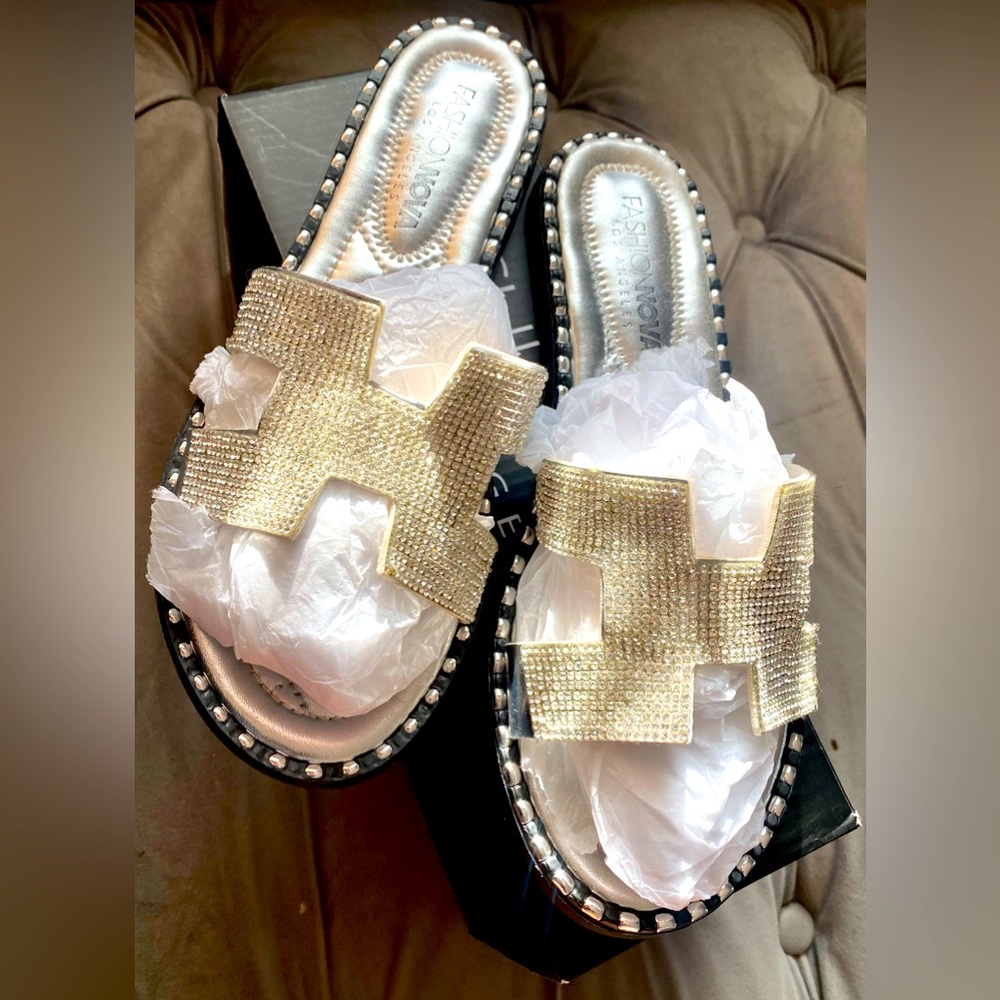 Fashion Nova sandals in silver. Size 7. Moderately worn.